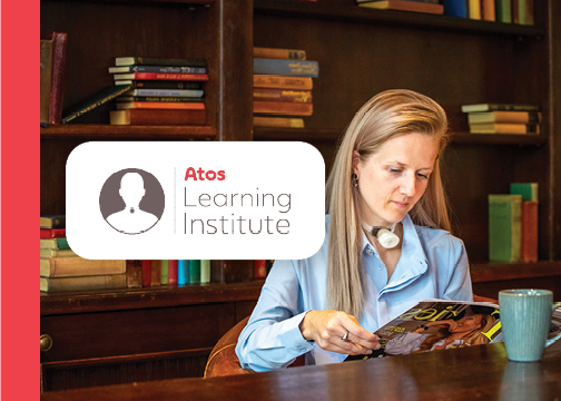 atos learning institute event banner, woman with tracheostomy reading in cafe